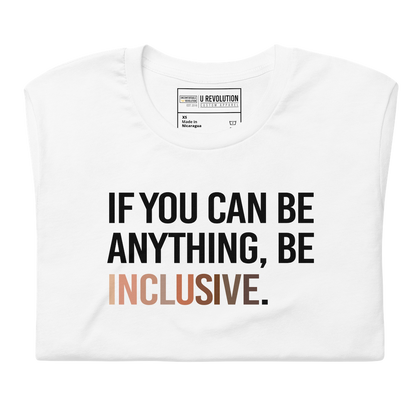 A photo of a white Be Inclusive t-shirt promoting racial diversity. On the front of the inclusive t-shirt is the phrase: 