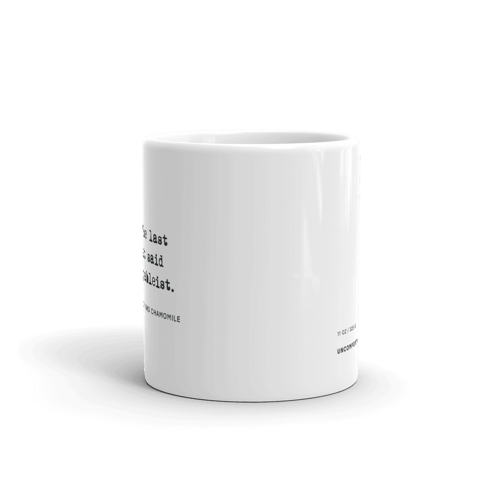 The ableist tears mug is white, with black text that reads: "no. 57. Tears of the last person that said something ableist. With hints of lemon and chamomile." 