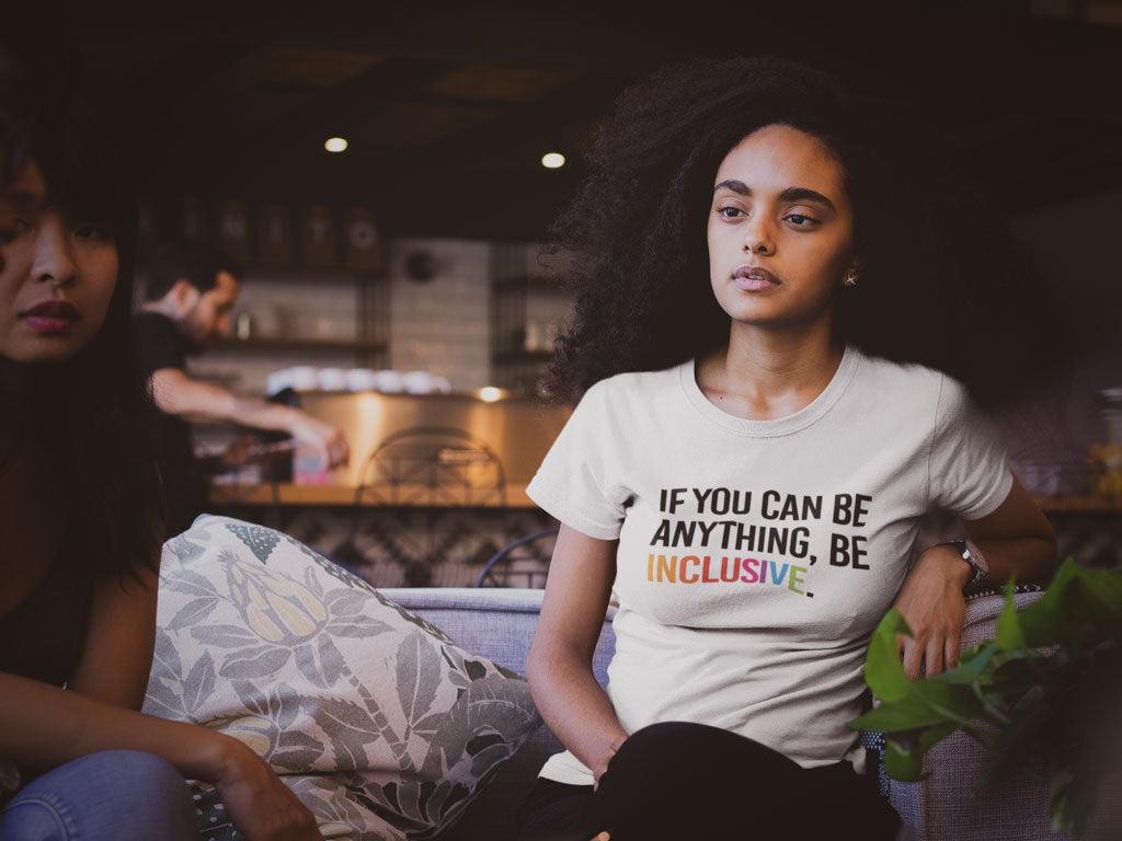 How can businesses support black lives? There is an arty-style photo of a black woman with curly hair wearing a URevolution t-shirt with the slogan printed on it: 