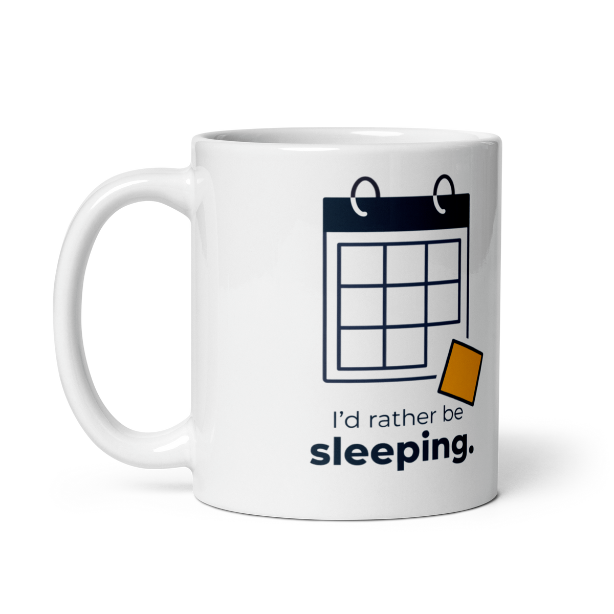 White 11 oz mug with its handle on the left, a dark calendar grid, a yellow square slipping free, and “I’d rather be sleeping.”