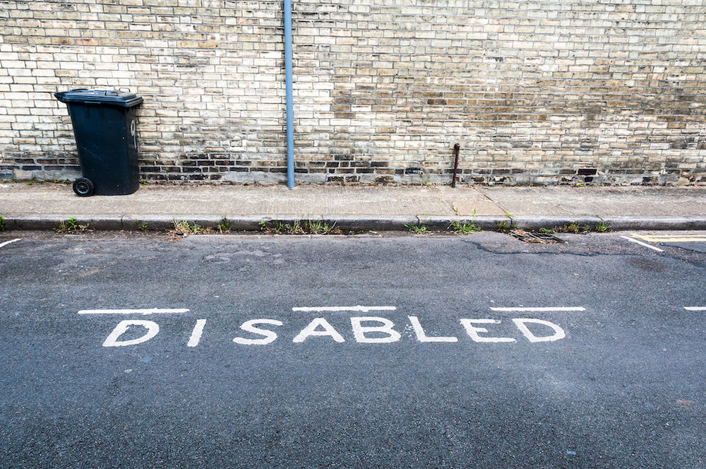 London 2012 Paralympics: a photo of an empty disabled parking space on a street in London