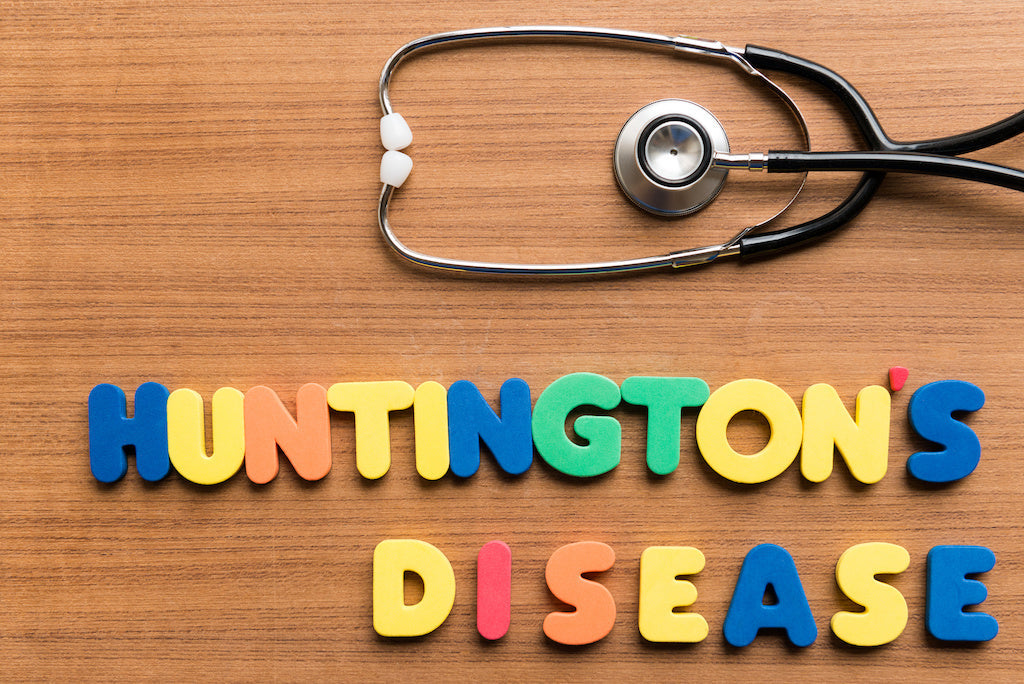 How to help someone with Huntington's Disease: a visual slide consisting of a stethoscope and the words Huntington's Disease