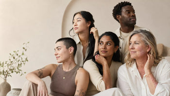 Diverse group of adults wearing hypoallergenic jewellery, with visible chronic skin conditions, representing inclusive fashion for people with sensitive skin.