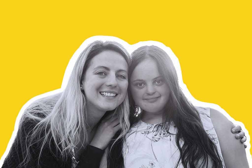 The infantilization of adults with disabilities needs to stop? Graphic photo collage of two persons hugging each other and smiling at the camera. They are in black and white and the background is yellow.