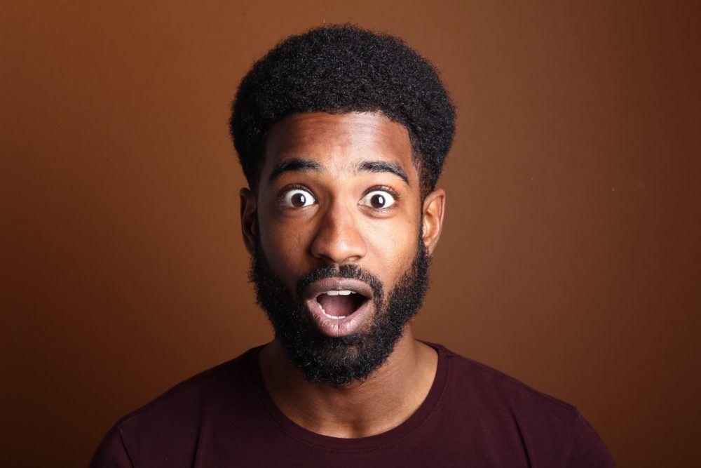 Do you poop during a colonoscopy? Photo of a man looking surprised.
