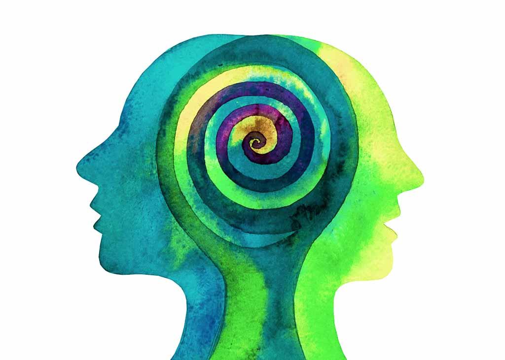 Is psychology a Western concept? A water-color illustration of two overlapping heads.