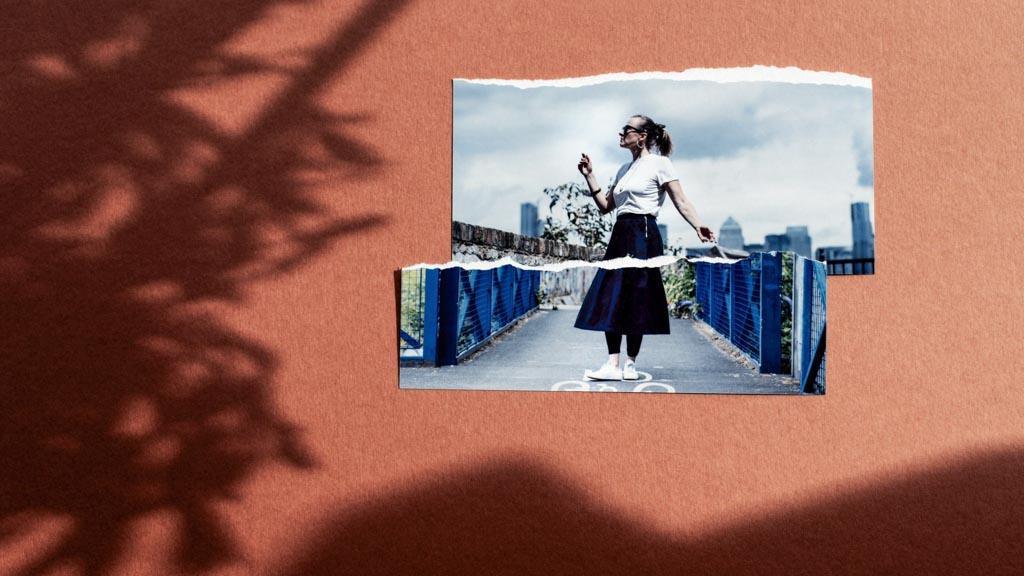 This image is a collage for an article about movement as medicine. A photo of Emma Warren dancing outdoors is torn in two and placed against a brown paper backing with the shadow of tree cast over the image.