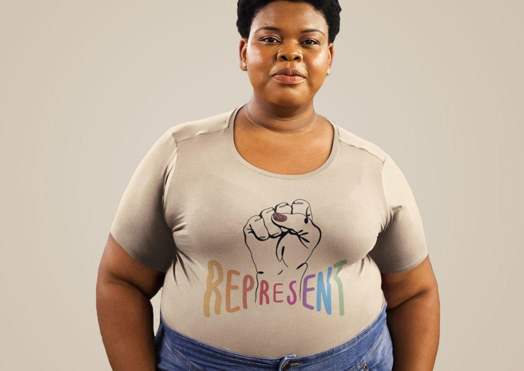 A photo of Black woman wearing one of URevolution's classic pieces of Represent Clothing.