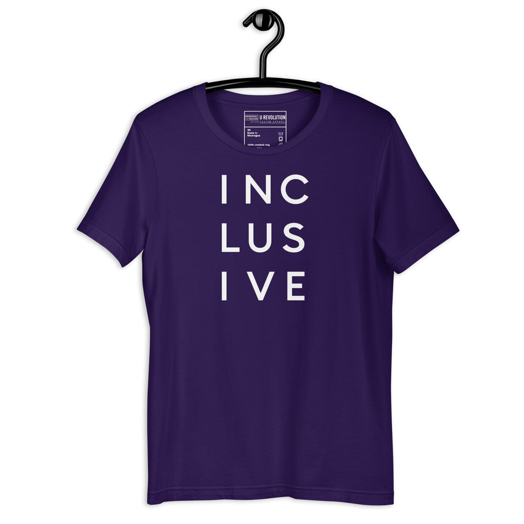 Purple INCLUSIVE Statement Tee displayed on a hanger – minimalist typography t-shirt featuring the word 'INCLUSIVE' spaced across three lines, symbolizing unity, diversity, and belonging.