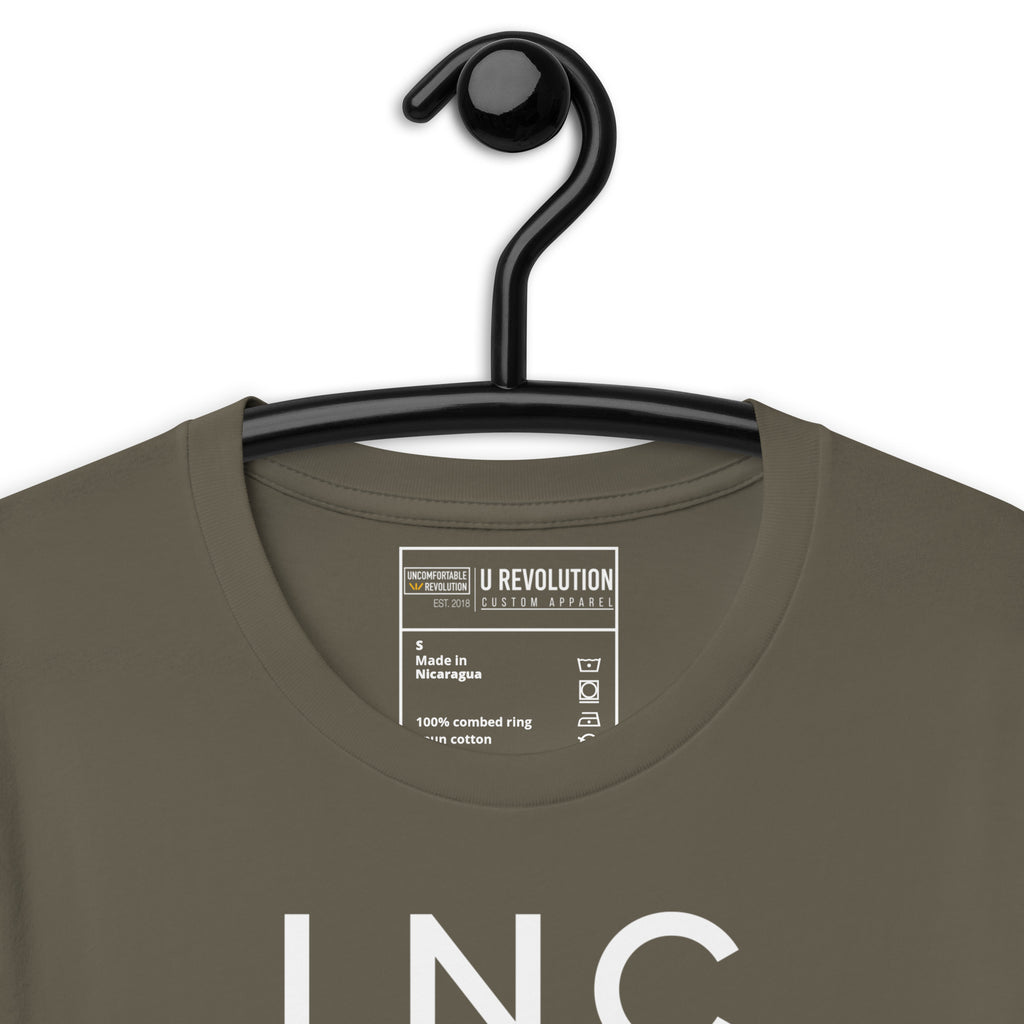 Close-up of the army INCLUSIVE Statement Tee typography – bold and minimalist lettering arranged in three-line format, representing diversity and inclusion.