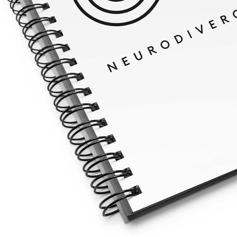 A close up view of an Infinity Symbol Journal with 'Neurodivergent' text – a notebook celebrating neurodiversity.