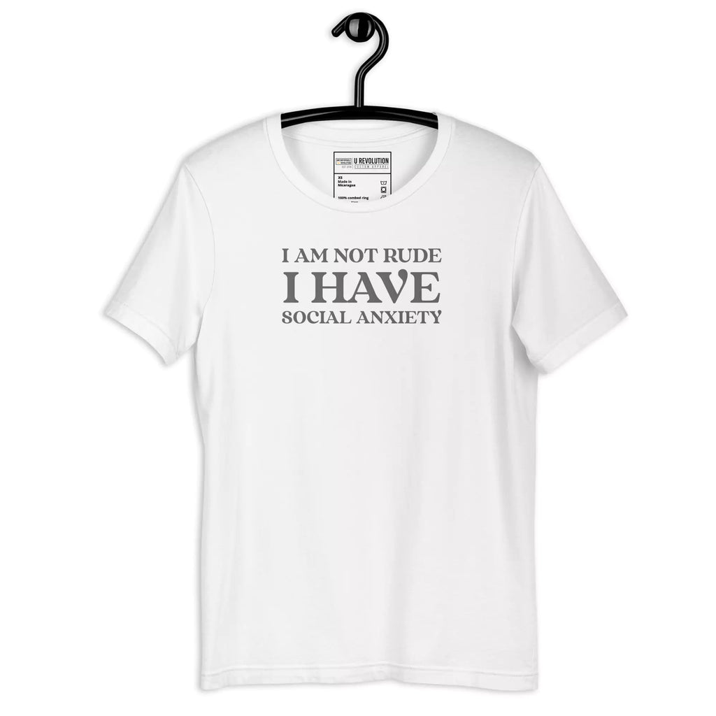 White t-shirt with white text that reads "I Am Not Rude, I Have Social Anxiety." A statement tee for social anxiety awareness