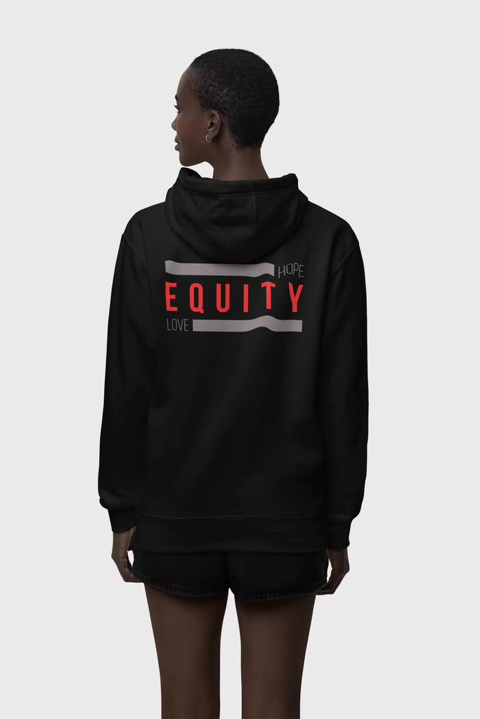 Black woman wearing a Zip-Up Equity Hoodie showing the back "Hope Equity Love" design on a white studio background.