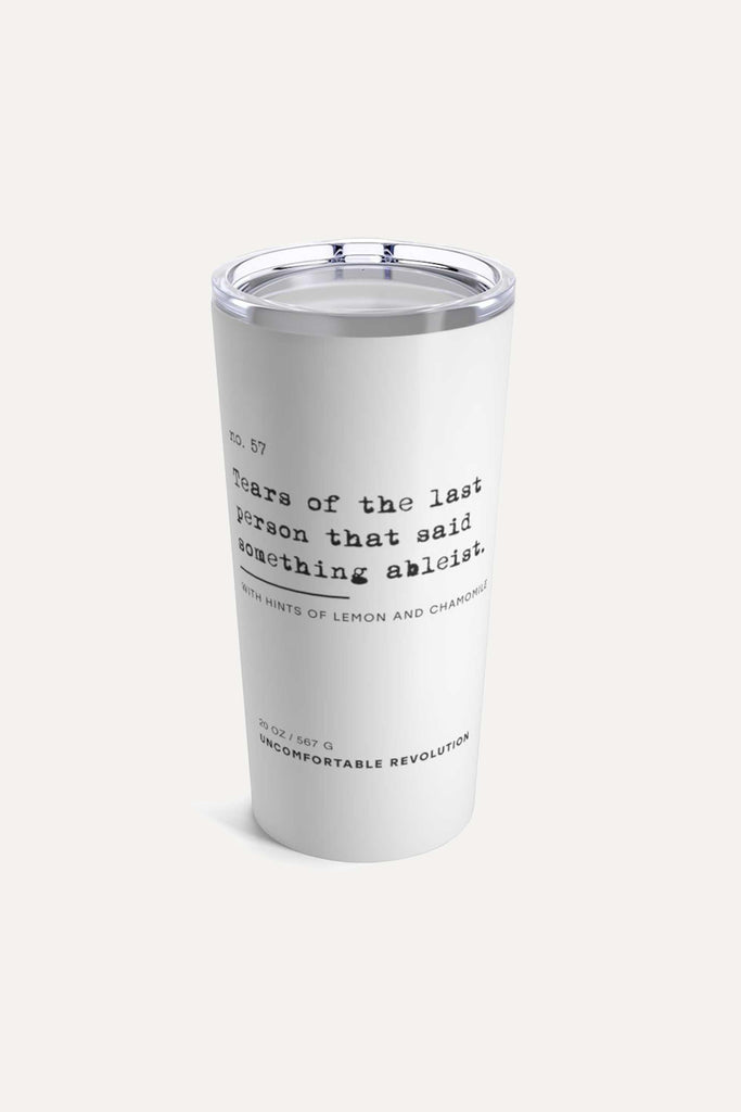 The ableist tears tumbler is white, with black text that reads: "no. 57. Tears of the last person that said something ableist. With hints of lemon and chamomile."