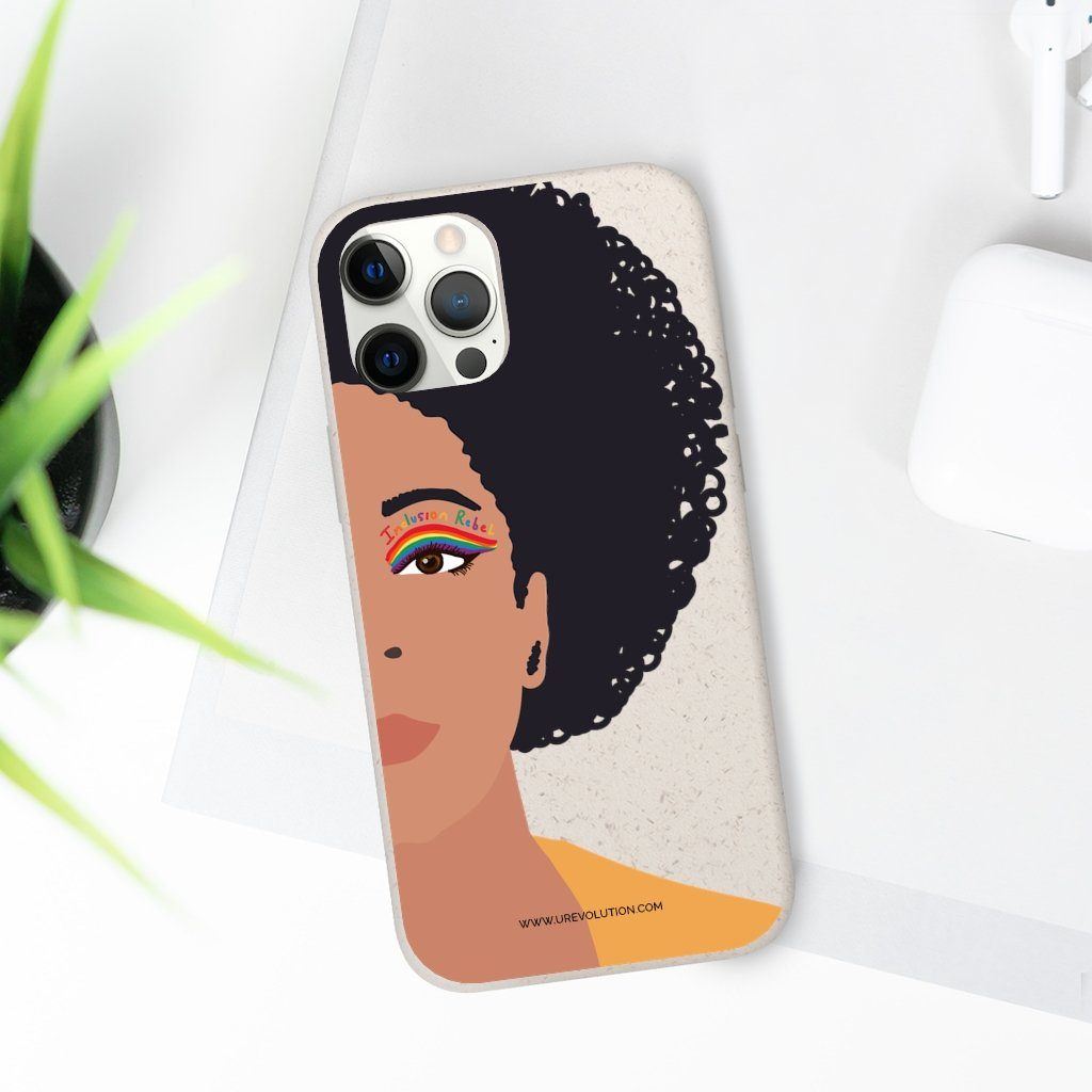 iPhone 12 Pro Inclusion Rebel Afro Phone Case. Printed on the back of the biodegradable phone case is an illustration of the right-hand half of a black person's face. They have a full afro and have a colorful eyeliner design above their right eye. The design includes a series of lines drawn in the colors of the LGTB flag with the words, Inclusion Rebel, outlined in a handwriting style above the lines.