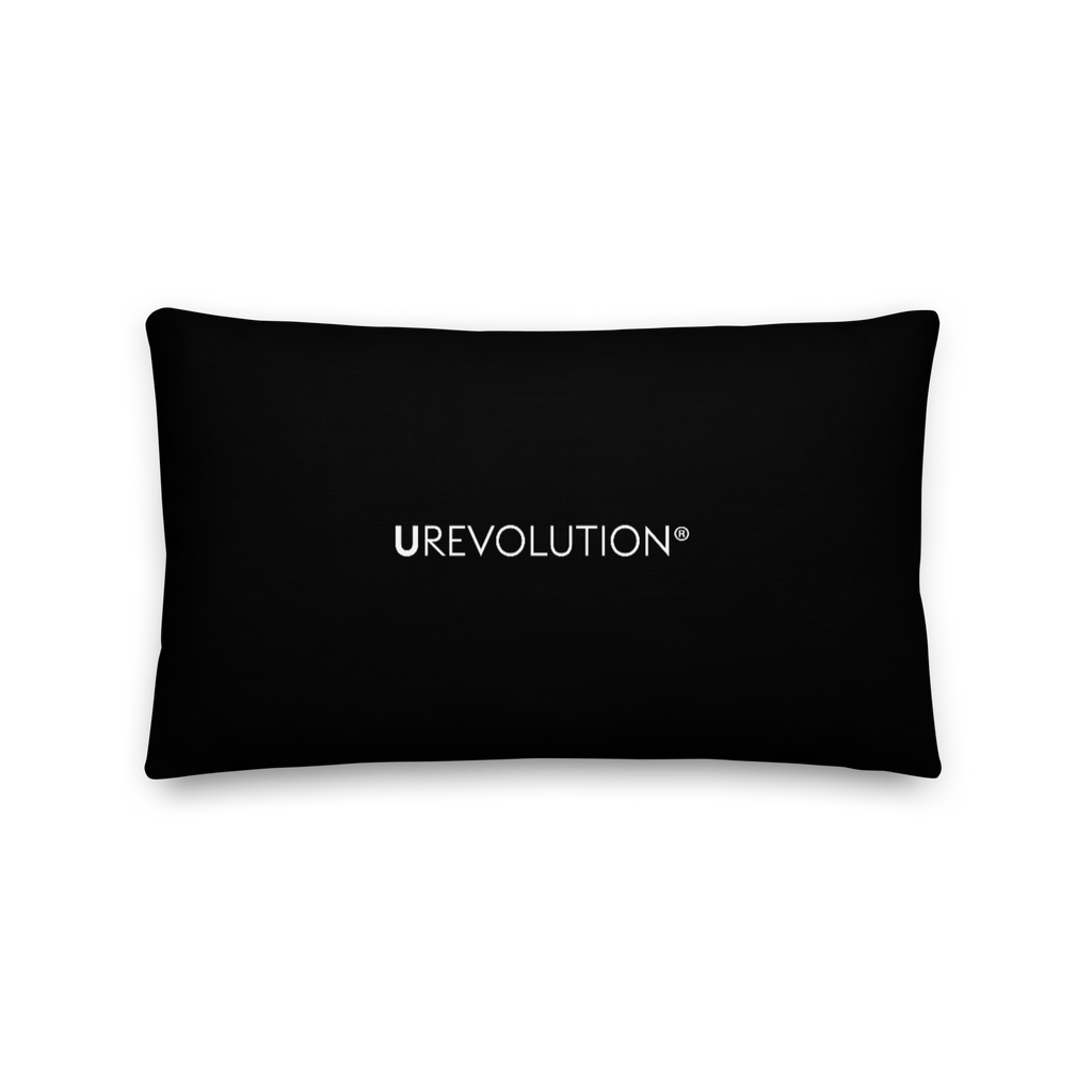 This is an image of the back of a black premium Be Inclusive throw cushion. In the middle of the rectangle throw cushion, the word 'URevolution' is printed in small white upper case letters.
