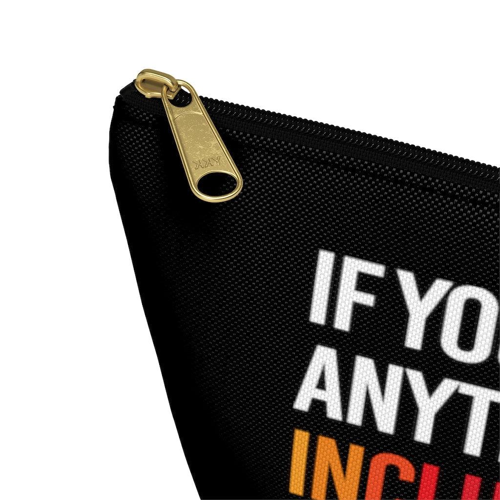 A close up of the corner of the black diversity and inclusion pouch showing the gold zip slider.