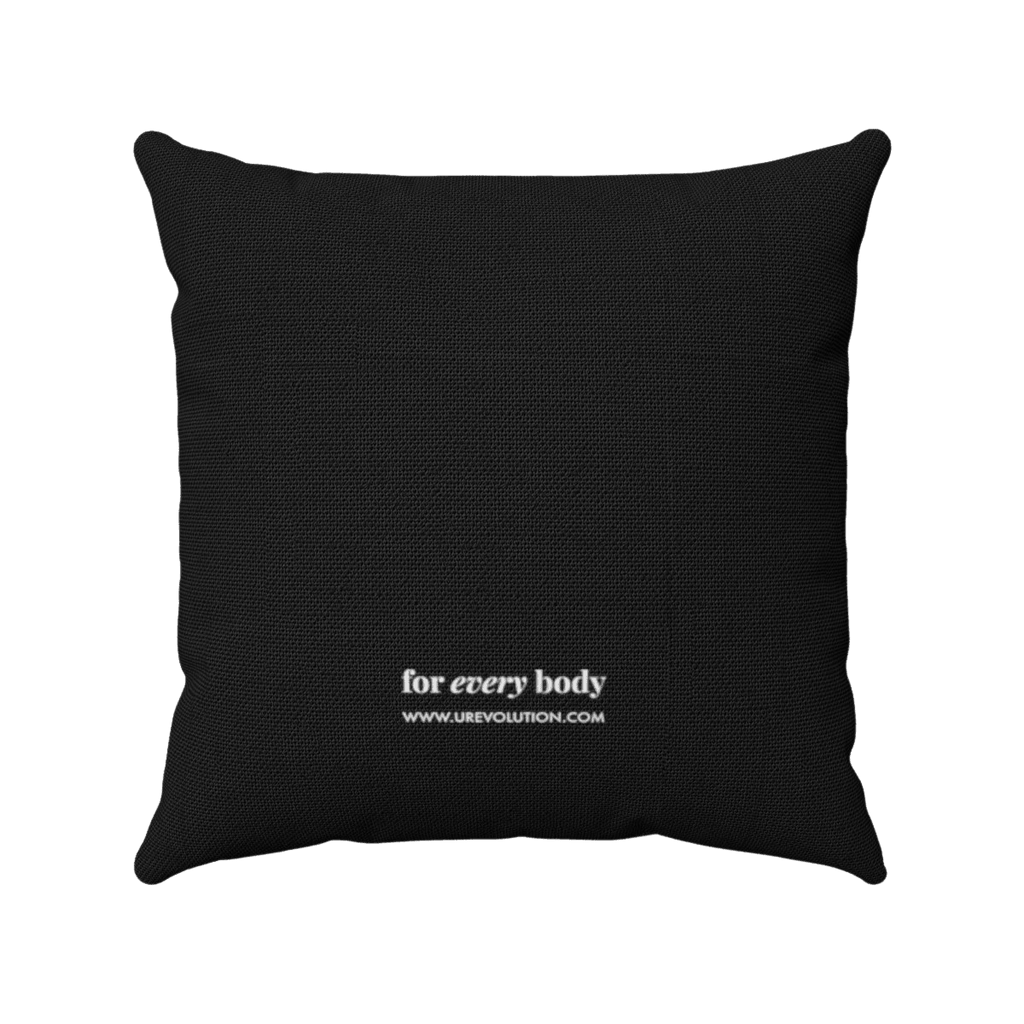 Back view of a view of a square Be Inclusive Black Throw Cushion. At the bottom of the  black throw cushion is a small white box with text printed in small black letters, "For every body www.urevolution.com" in black. "Every" is in italics for emphasis.