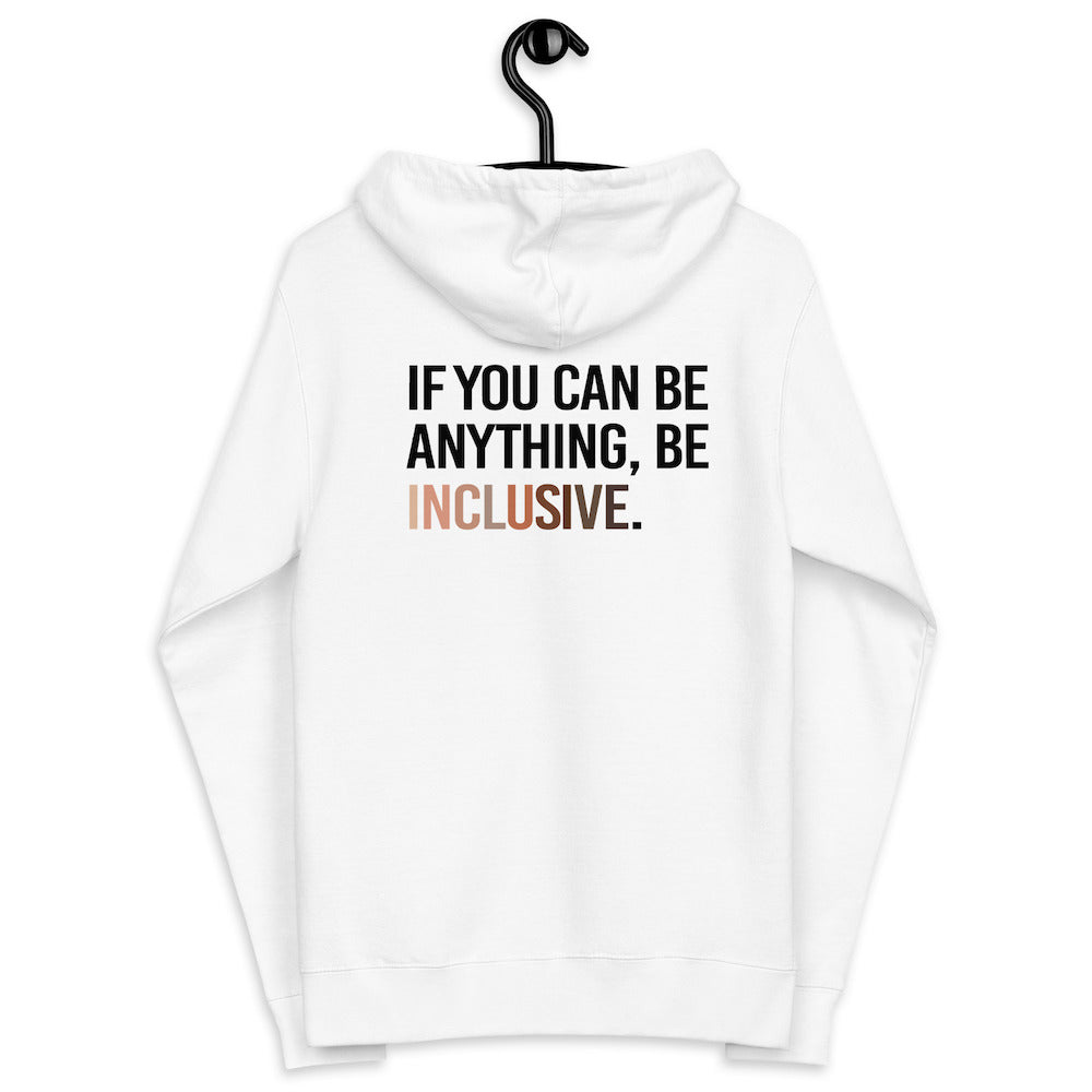 The back of a white Be Inclusive Diversity Zip Up Hoodie. On the back of the inclusive diversity hoodie is the phrase: "If you can be anything, be inclusive," in upper case letters. The text is all black, except the word "Inclusive," which is in different skin colors, with the lightest shade on the left and the darkest on the right. The hoodie is displayed on a black hanger.