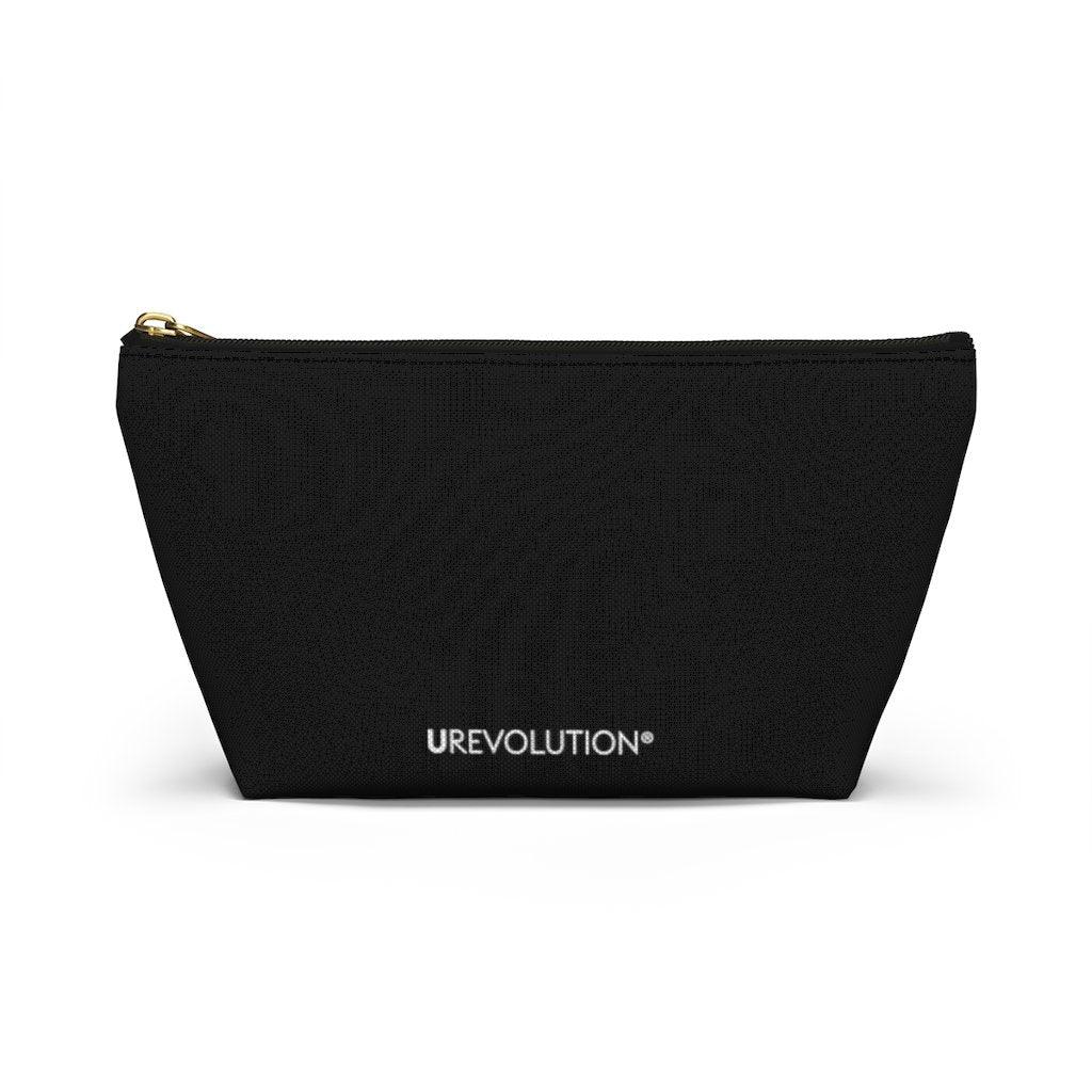 Photo of a Be Inclusive Pouch. The black pouch has the words BE Inclusive printed in the middle of it in large white upper case letters. The design takes up the middle 1/3 of the side of the pouch. On the bottom edge of the pouch on the reverse side is the word URevolution printed in small black upper case letters. The pouch has a black zip and gold closure. The rest of the pouch is black.