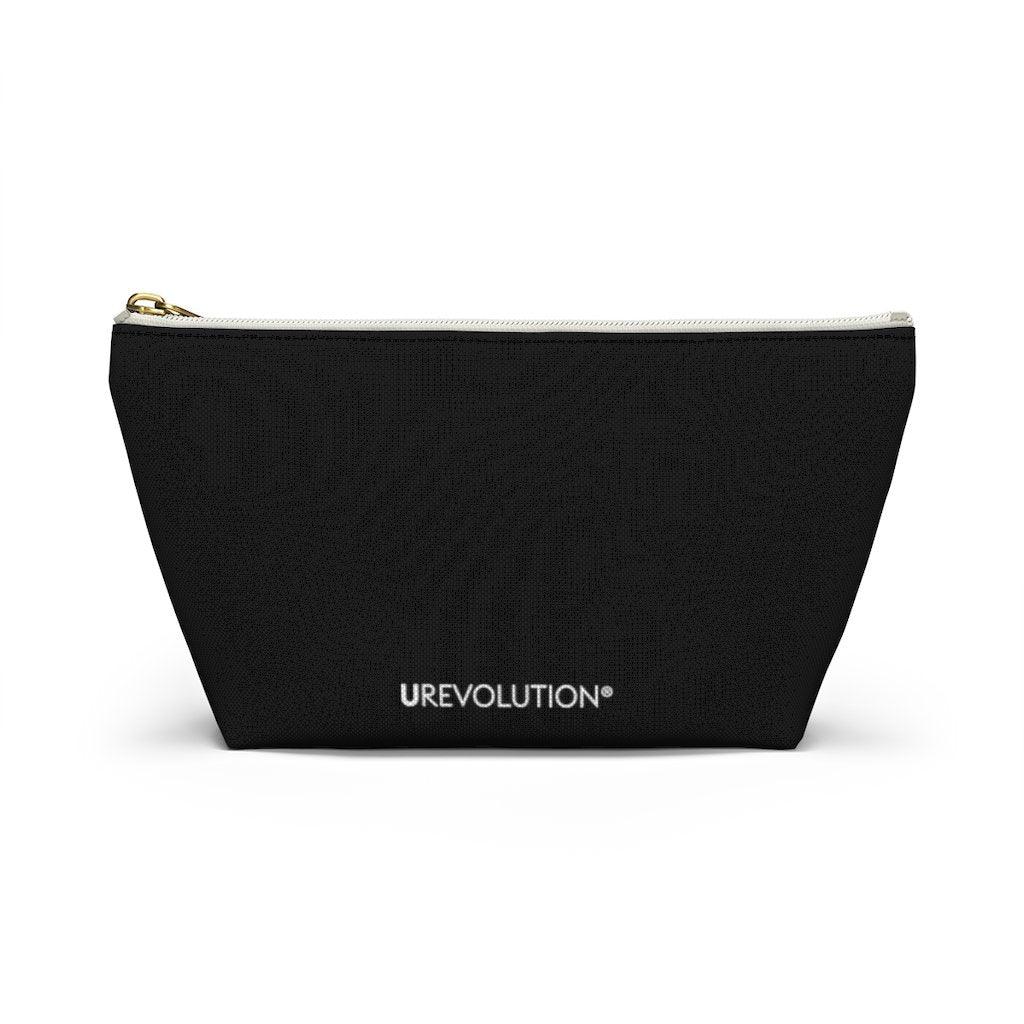 Photo of a Be Inclusive Pouch. The black pouch has the words BE Inclusive printed in the middle of it in large white upper case letters. The design takes up the middle 1/3 of the side of the pouch. On the bottom edge of the pouch on the reverse side is the word URevolution printed in small black upper case letters. The pouch has a white zip and gold closure. The rest of the pouch is black.