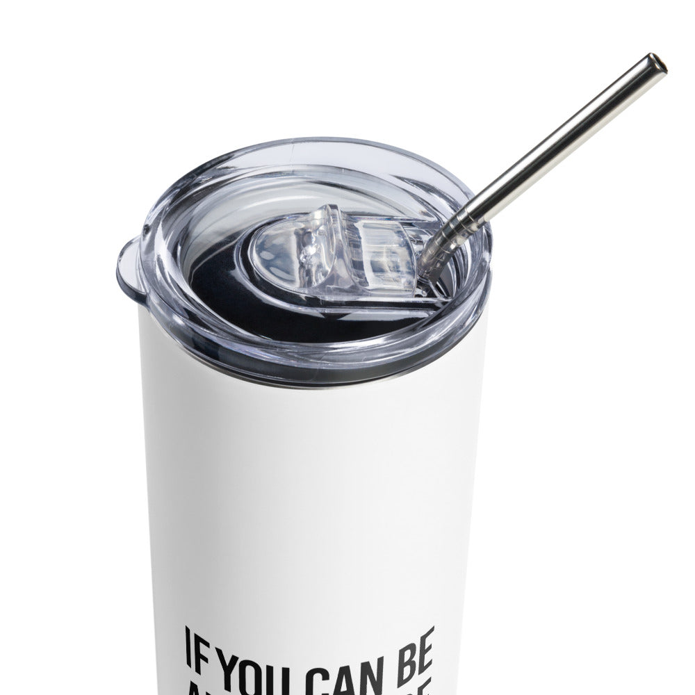 A 20 oz Be Inclusive stainless steel travel mug. The mug has a stainless steel straw and plastic lid. In the middle of the mug is the phrase, printed in black upper case letters, 'If you can be anything, be inclusive.' The word inclusive is in the colors of the rainbow.