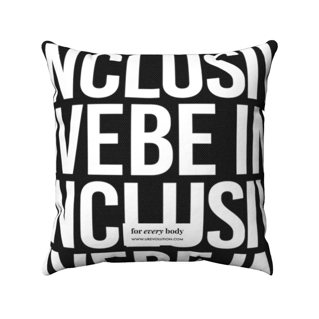 Back view of a black and white be inclusive throw cushion. The nclusive throw cushion is black with the words BE INCLUSIVE printed in large white bold caps repeated across three lines. At the bottom of the throw cushion is a small white box with text printed in small black letters, "For every body www.urevolution.com" in black. "Every" is in italics for emphasis.