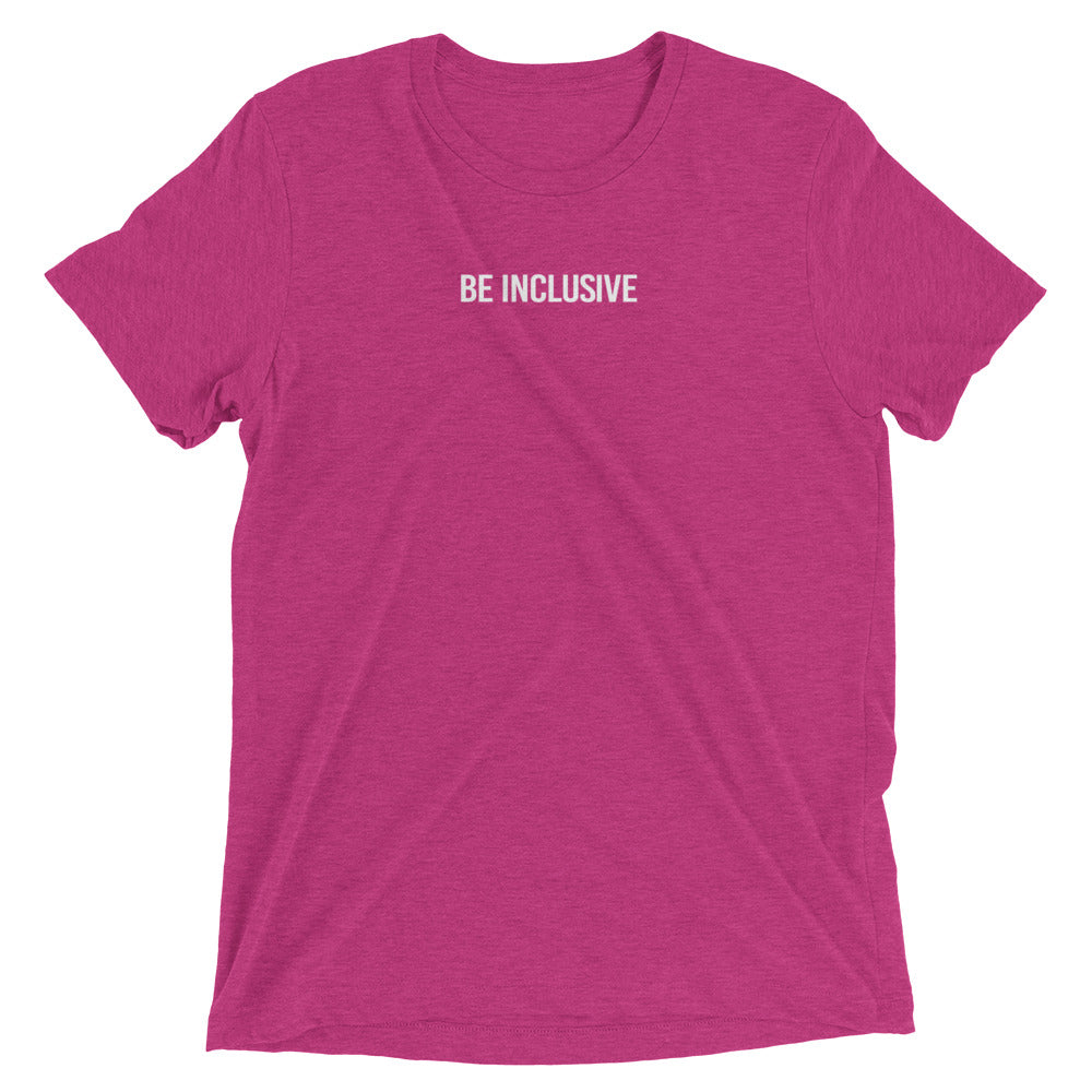 Berry unisex tri-blend t-shirt. Printed in the middle top one-third of the t-shirt in white upper case letters, about one inch high is the phrase - Be Inclusive. 