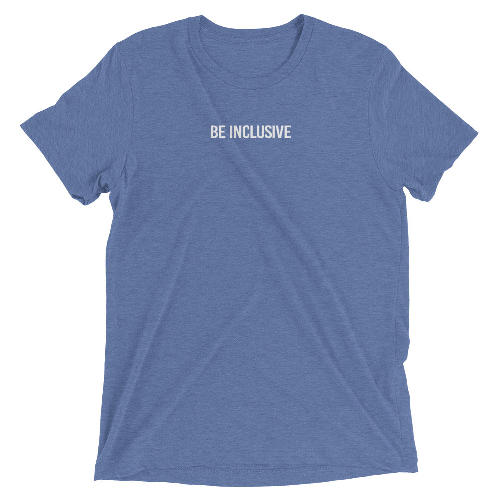 Blue unisex tri-blend t-shirt. Printed in the middle top one-third of the t-shirt in white upper case letters, about one inch high is the phrase - Be Inclusive. 