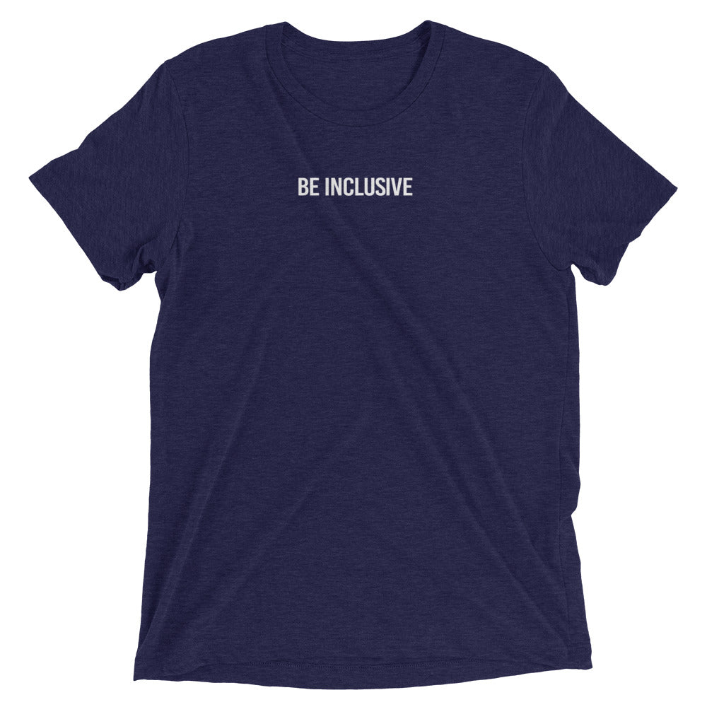Navy unisex tri-blend t-shirt. Printed in the middle top one-third of the t-shirt in white upper case letters, about one inch high is the phrase - Be Inclusive. 