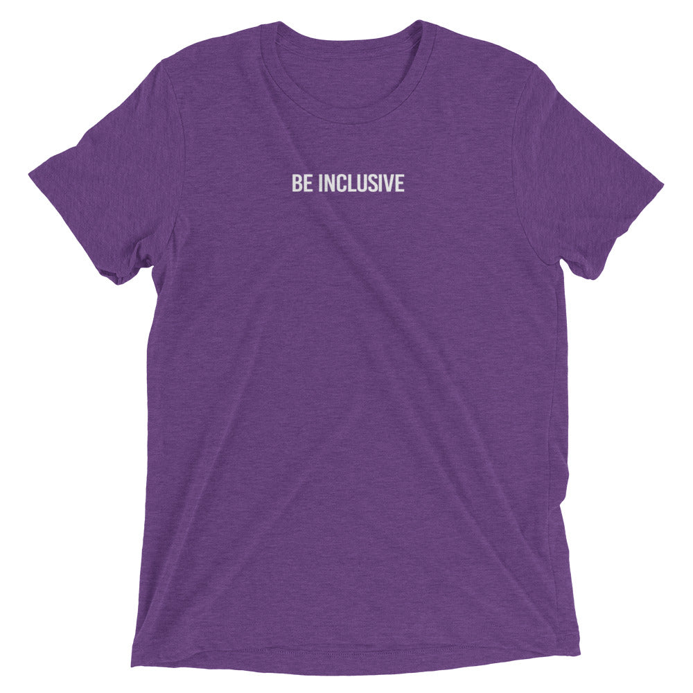 Purple unisex tri-blend t-shirt. Printed in the middle top one-third of the t-shirt in white upper case letters, about one inch high is the phrase - Be Inclusive. 