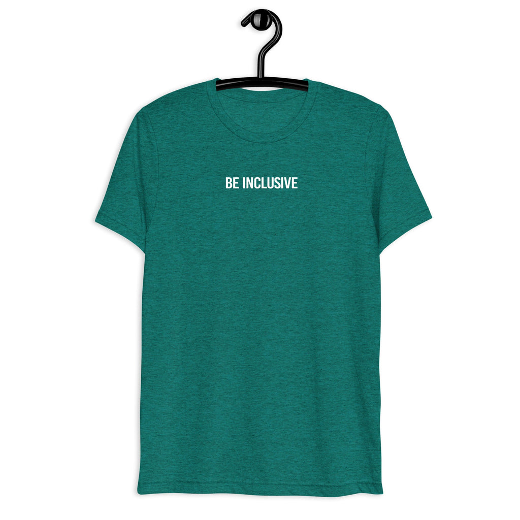 Teal unisex tri-blend Be Inclusive t-shirt. Printed in the middle top one-third of the t-shirt in white upper case letters, about one inch high is the phrase - Be Inclusive. The t-shirt is hanging on a black plastic hanger against a blank wall.
