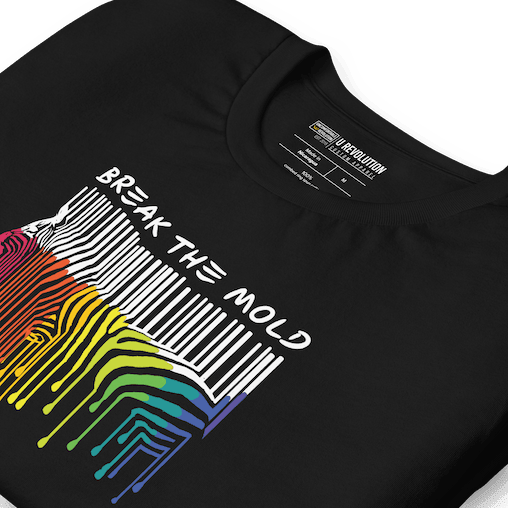 This is a photo of a Break the Mold t-shirt. In the middle of the t-shirt is a graphic of zebra in the silhouette of a barcode. The top half of the zebra are vertical white stripes, which then change just below the back into the colors of the rainbow. The bottom of each stripe has a paint drip mark. Just above the zebra's back is the phrase, in upper case, 'break the mold.' 