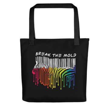 An image of a black tote bag against a plain background. In the middle of the bag is a graphic of zebra in the silhouette of a barcode. The top half of the zebra are vertical white stripes, which then change just below the back into the colours of the rainbow. The bottom of each stripe has a paint drip mark. Just above the zebra's back is the phrase, in upper case, 'break the mold.'
