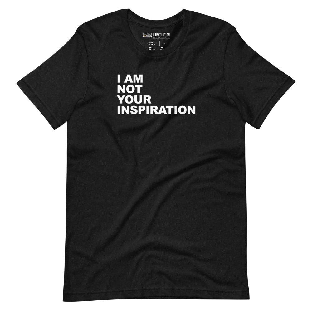 This is a black-heather 'I Am Not Your Inspiration" t-shirt. On the top third of the inspiration shirt is the phrase, "I am not your inspiration," printed over four lines in white upper case letters.