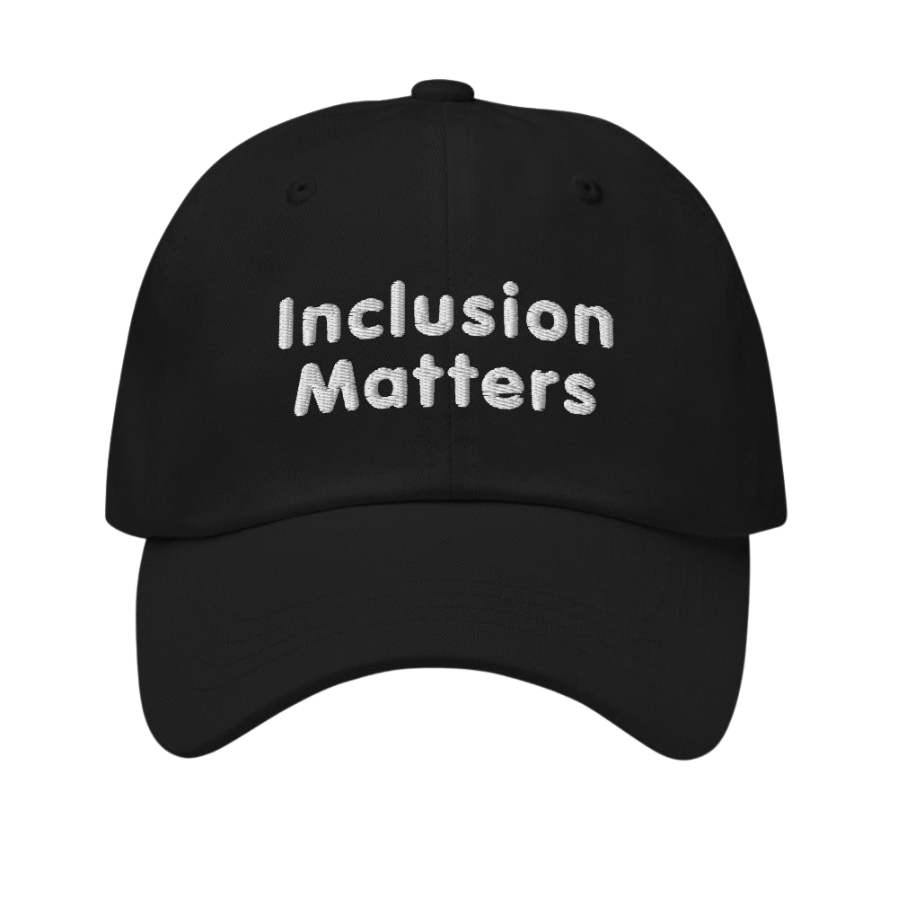 This is a photo of a black Inclusion Matters Baseball Cap. On the front of the baseball cap above the visor are two words, 'Inclusion Matters.' printed in white sentence case letters over two lines.