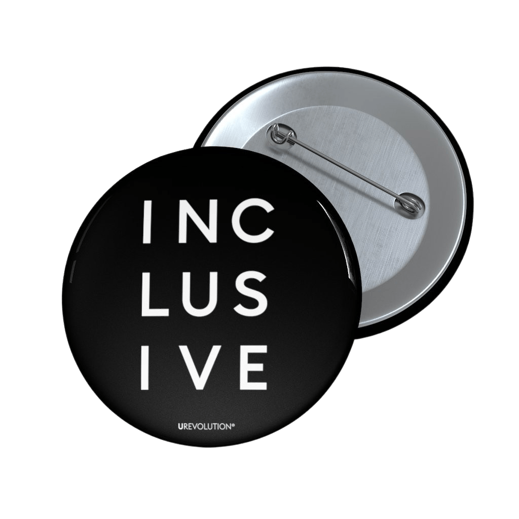 2.25" black inclusive pin button. On the front of the inclusive pin button is the word inclusive. The word inclusive is printed in black over three lines, with three letters on each line: INC LUS IVE. On the bottom edge of the pin, beneath the word inclusive, is the word URevolution in a small discrete font. horizontal black line.