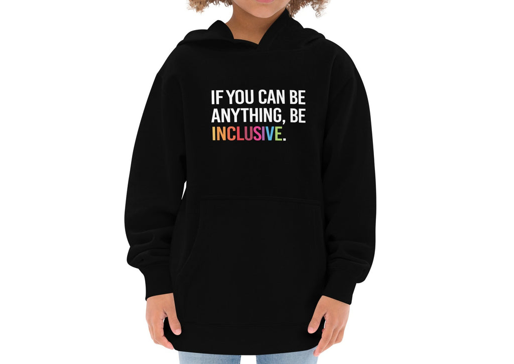 This is a photo of a black be inclusive kids hoodie. In the top one-third of kids hoodie, in white upper case letters, is the phrase: 'if you can be anything, be inclusive.' The word inclusive is in the colors of the rainbow.