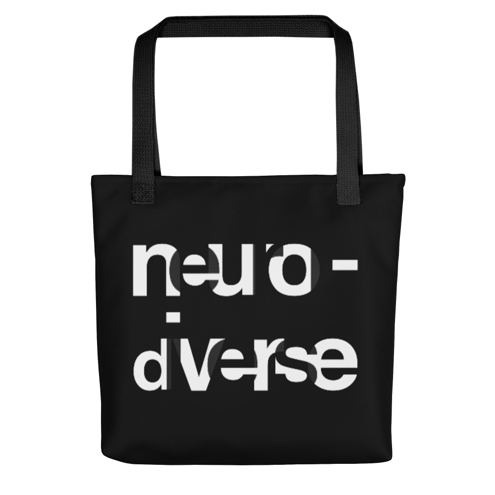 In the middle of the neurodiverse black tote bag, the word NEURODIVERSE is printed in large alternating black and white letters, taking up about two-thirds of the tote bag surface.