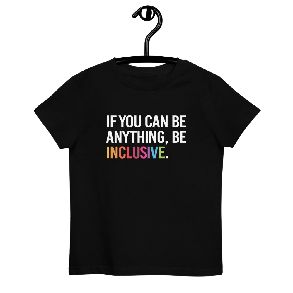 This is a photo of a kids black premium organic Be Inclusive tee. On the front of the t-shirt, the phrase, 'If you can be anything, be inclusive,' is printed in white capital letters. The word INCLUSIVE is in the colors of the rainbow.