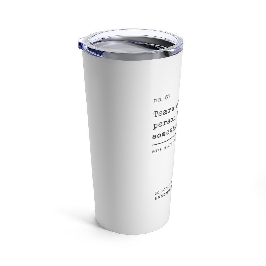 The ableist tears tumbler is white, with black text that reads: "no. 57. Tears of the last person that said something ableist. With hints of lemon and chamomile."