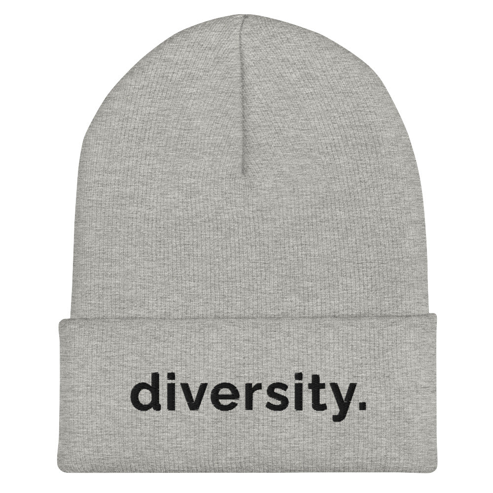 A heather grey diversity beanie has the word 'diversity' embroidered on the front cuff in black bold lower case letters.