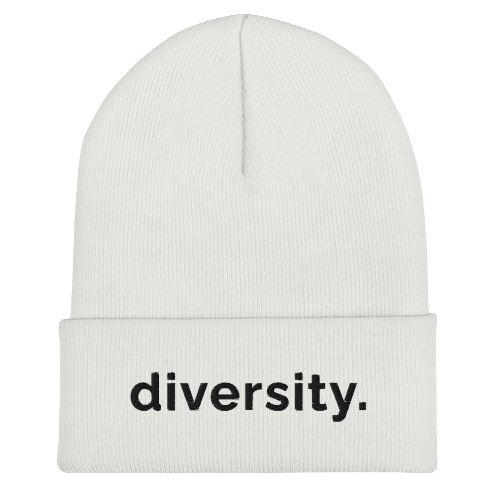 A white diversity beanie has the word 'diversity' embroidered on the front cuff in black bold lower case letters.