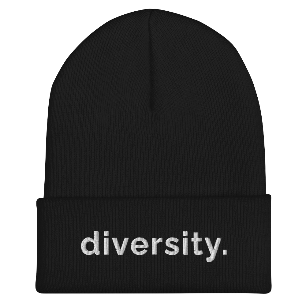 A black diversity beanie has the word 'diversity' embroidered on the front cuff in white bold lower case letters.