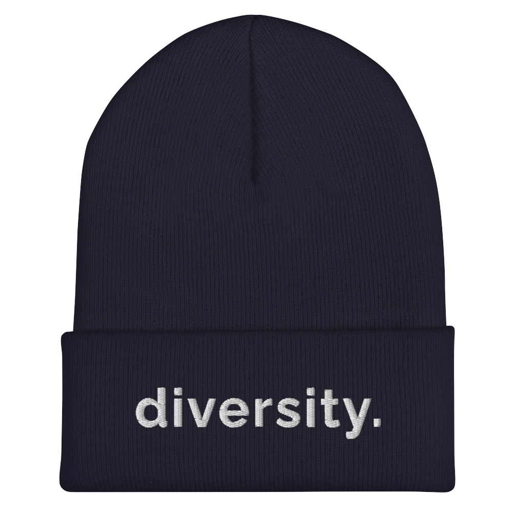 A navy diversity beanie has the word 'diversity' embroidered on the front cuff in white bold lower case letters.