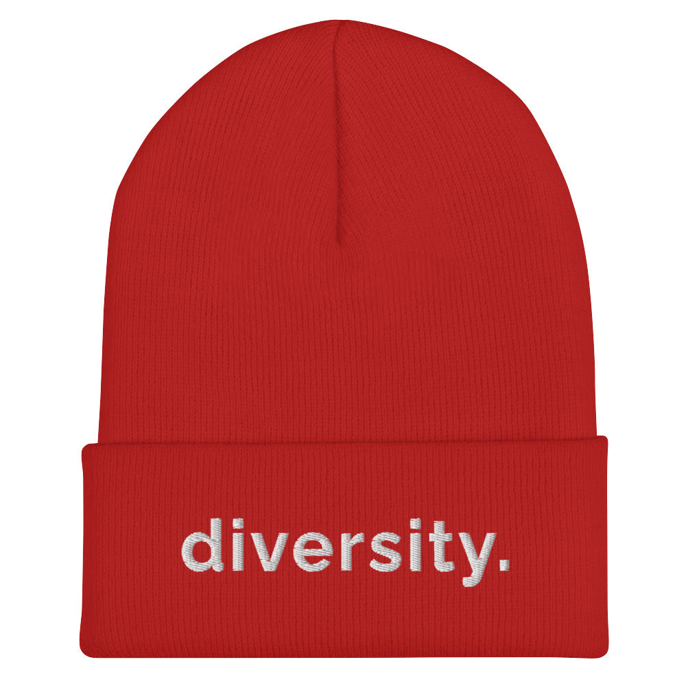 A red diversity beanie has the word 'diversity' embroidered on the front cuff in white bold lower case letters.