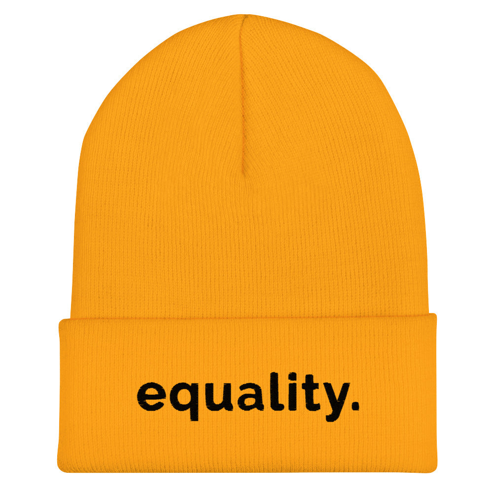 A gold hypoallergenic Equality beanie against a plain white background. On the front of the beanie, the word 'Equality,' is embroidered in black sentence case letters on one line.