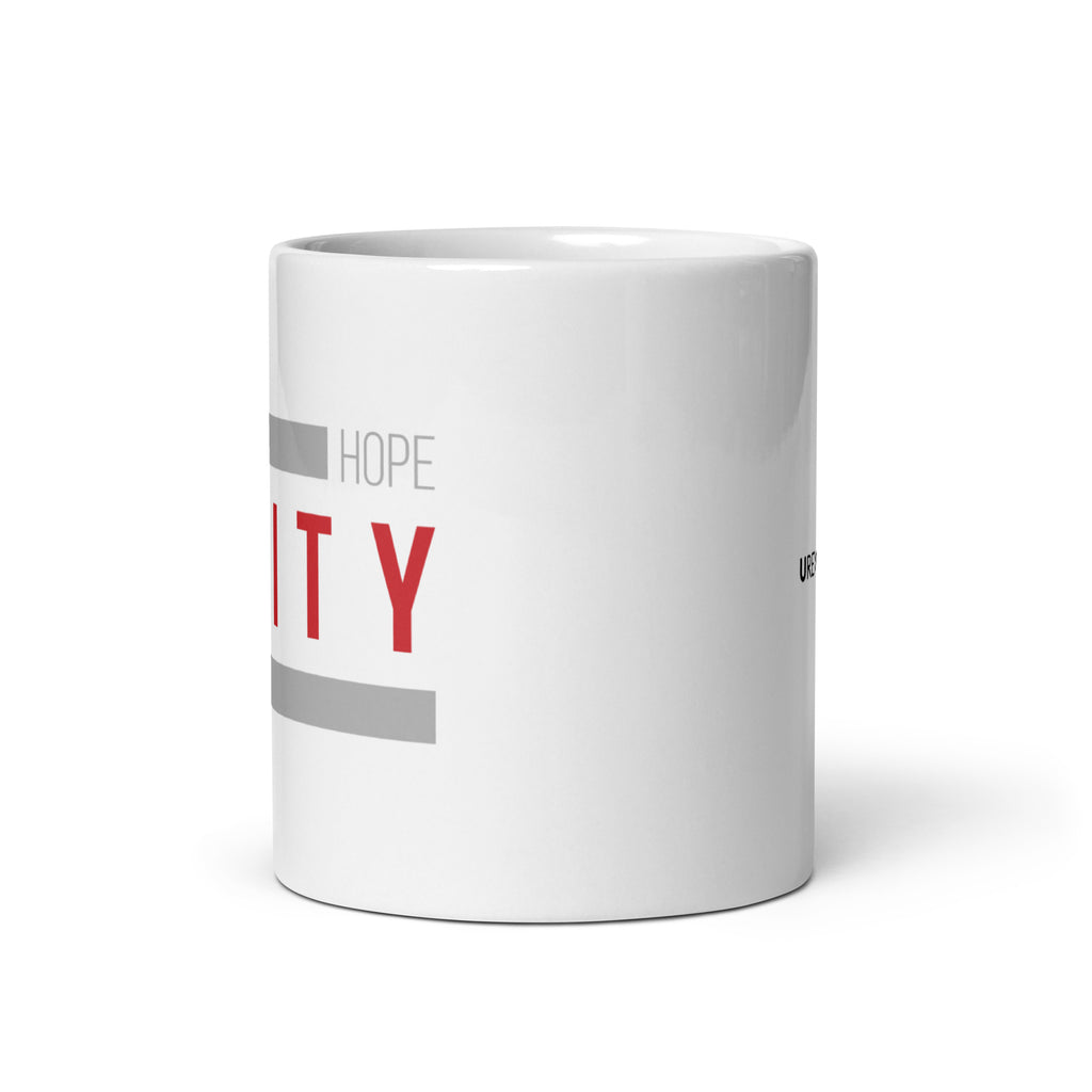 A side view of a white ceramic Equity mug. 