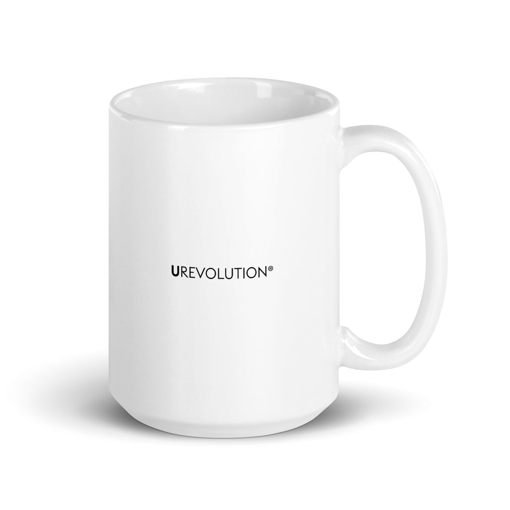 The back view of a white 15 oz ceramic mug. In the middle of the mug is the word UREVOLUTION in small black upper case letters.
