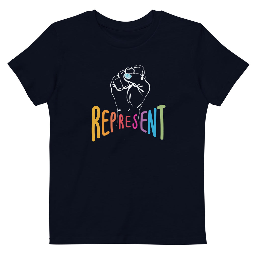 Photo of an organic kids french navy Represent tee. In the center of the organic tee is a white drawing of a raised clenched fist, with the handwritten word “represent,” written in upper case rainbow colors beneath the fist.
